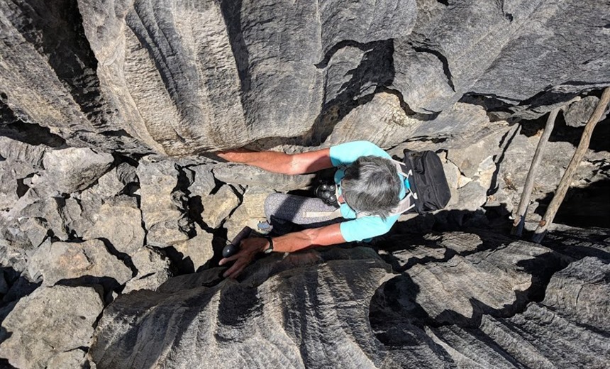 Still going strong: Hilary navigates the tsingy formations in Ankarana National Park. © Daniel Austin