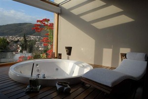 Bath with views at Kkala Boutique Hotel
