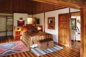 Bedroom at Blancaneaux Lodge