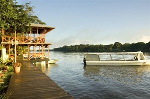 By the river in Tortuguero at Manatus Lodge