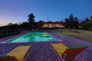 Goha Hotel at night - exterior with pool