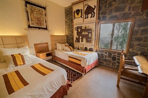 Triple room. All rooms have traditional decor