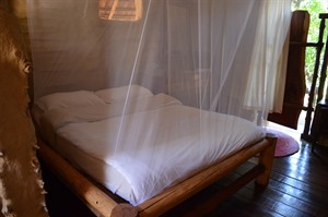 Bed at Iharana Bush Camp