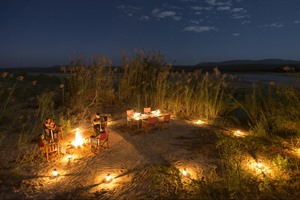 Dining outdoors at night, Mandrare