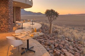 Dining outside at Sossusvlei Desert Lodge