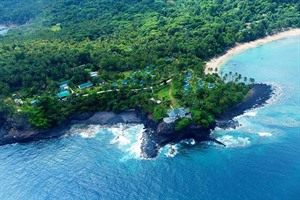 Aerial of the property and private beach