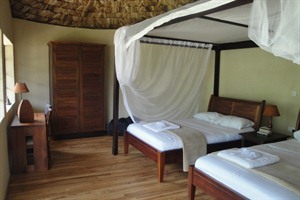 Bedroom at Mahogany Springs Lodge
